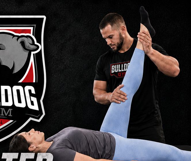 Bulldog Gym assisted stretch technician working with a client
